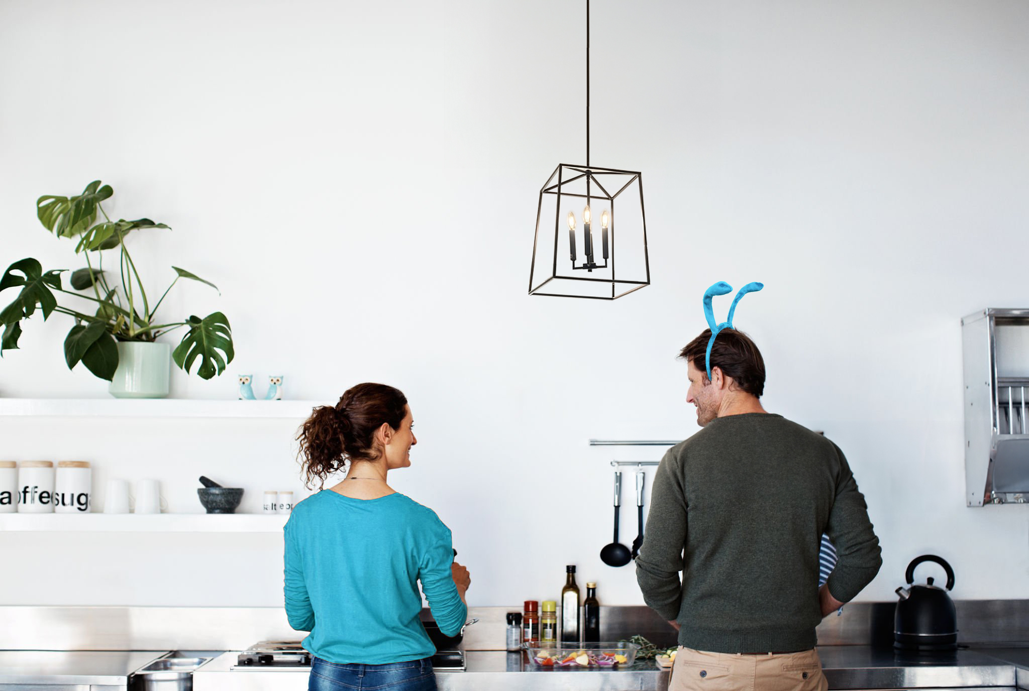 Rearview shot of a mature couple cooking in their kitchen
